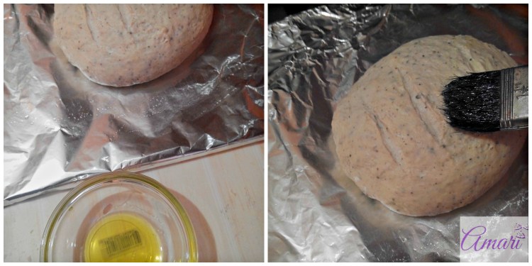 Applying olive oil on the loaf