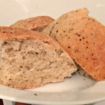 Plate of sliced herbal bread